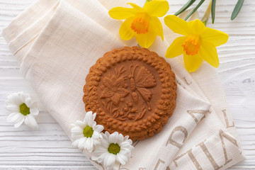 Easter gluten free ginger cookies on the kitchen towel background, selective focus