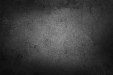 Grey textured dark concrete wall background