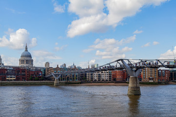 Fototapeta premium Afternoon view of the St. Paul's Cathedral, Millennium Bridge and Thames River