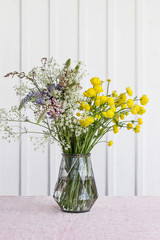 colorful spring wildflower bouquet in vase 