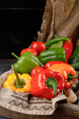 Colorful chili peppers on a piece of rustic towel.
