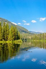 Fototapeta na wymiar Majestic mountain lake in Canada. Lightning Lake in Manning Park in British Columbia.