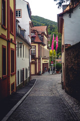 A narrow street in Heidelberg Altstadt, the old town section of Heidelberg, Germany