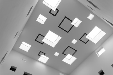 Geometric black and white skylight pattern in a ceiling