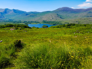 Landscape view and blue lake in the distance 