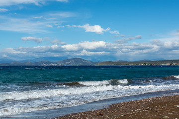 Dramatic colorful seascape with view on mountains of Peloponnese, Greece