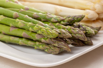 Fresh raw organic white and green asparagus vegetable ready to cook