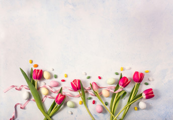 Easter floral background with tulips and eggs, easter and spring soncept, creative layout, copy space background
