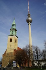 Famous tv tower of Berlin, Germany with St. Mary church