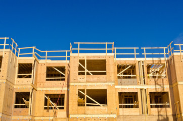 A new home under construction over blue sky in Vancouver, Canada.