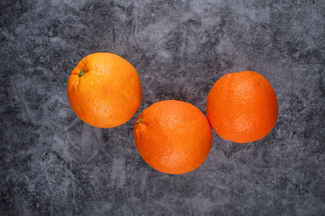 Random selected oranges on a blue background.