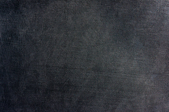 dark surface of stucco wall.