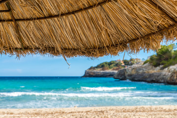Fototapeta na wymiar Strand Urlaub im Sommer Mallorca mit Meerblick 