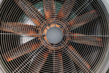 several large industrial fans together in a foundry steel workshop