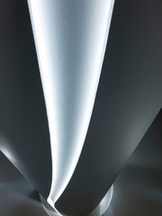 ABstract arhitecture image of illuminted with LED lights column and floor