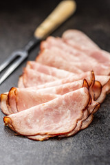 Sliced salami sausage. Smoked ham.