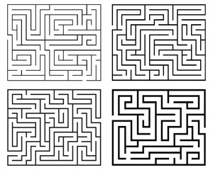 Four black  mazes on a white background 