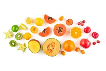 Creative fresh fruits layout. Papaya, apple, orange, kiwi, melon isolated on white background. Healthy fruity diet concept. Tropical mix citrus background. Colorful raw fruit flat lay.