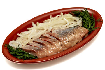 Snack of lightly salted herring with pickled onions