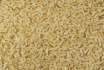 Parboiled rice background and texture