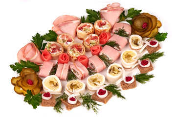 rolls of bacon, ham, garlic, pickles, horseradish and rye bread
