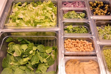 Salad bar with vegetables in the restaurant, healthy food.