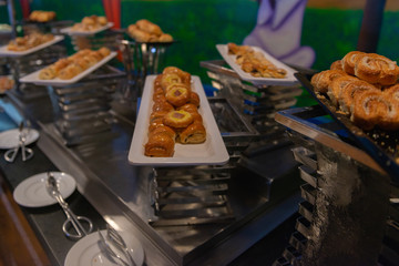 Sweet pastries on a self-service restaurant table