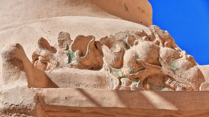Relief carving-modern clay stupa-foot of Yulin caves. Guazhou county-Gansu province-China-0708