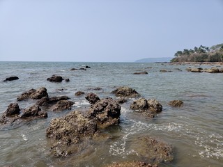 Fototapeta na wymiar Rocky beaches at Goa, India