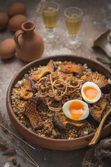 Buckwheat pilaf with mushrooms, onion and eggs