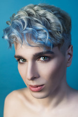 beauty portrait of young man with colored hair