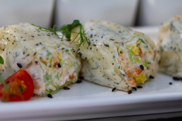 Fresh spring rolls with tomato. Close up.