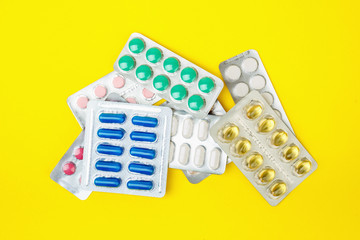 group of pharmaceutical medication and medicine pills in packs