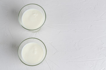 Homemade fermented drink - kefir on a white background with copy space.