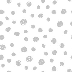 Dot doodles seamless pattern. Hand drawn circles texture background.