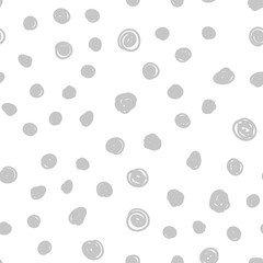 Dot doodles seamless pattern. Hand drawn circles texture background.