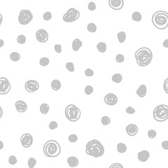 Dot doodles seamless pattern. Hand drawn circles texture background.