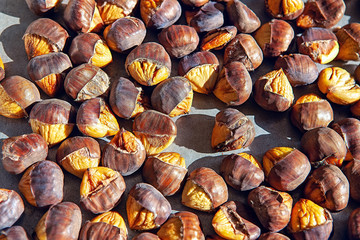 background with tasty roasted chestnuts