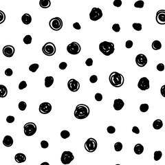 Dot doodles seamless pattern. Hand drawn circles texture background.