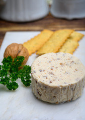 Spread cream cheese with fresh figs and wanuts close up