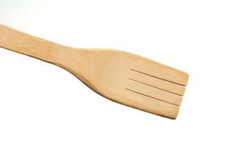 Wooden fork from kitchen utensils on a white background