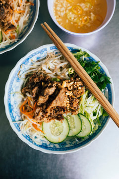 High angle close up of Bun thit nuong-rice noodles with grilled pork and fresh herb.,Hue