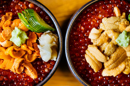 High angle close up of uni, sea urchin, with salmon roe and rice.,Otaru