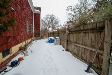 backyard covered with snow in winter