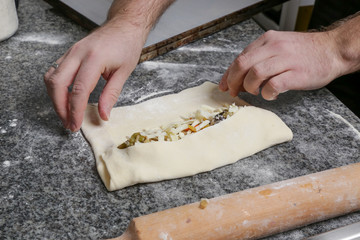 Process of making Italian appetizer stuffed bread, making of simple savory stuffed bread, serie of photos