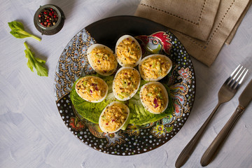 Deviled eggs. Stuffed egg halves, appetizer. Flat lay image