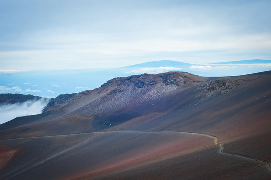 Volcano crater area, Haleakala, Maui, Hawaii - The island of Hawaii, Big Island in distance