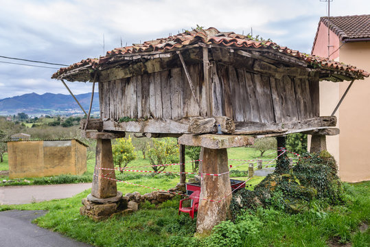 Old granary on a pillars called horreo in Guerres village in Asturias region of Spain