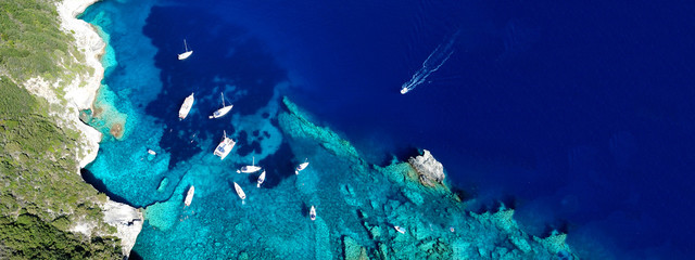 Aerial drone ultra wide photo of tropical Caribbean bay with white sand beach and beautiful...