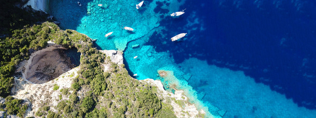 Aerial drone ultra wide photo of tropical white rocky bay of blue lagoon with turquoise clear...
